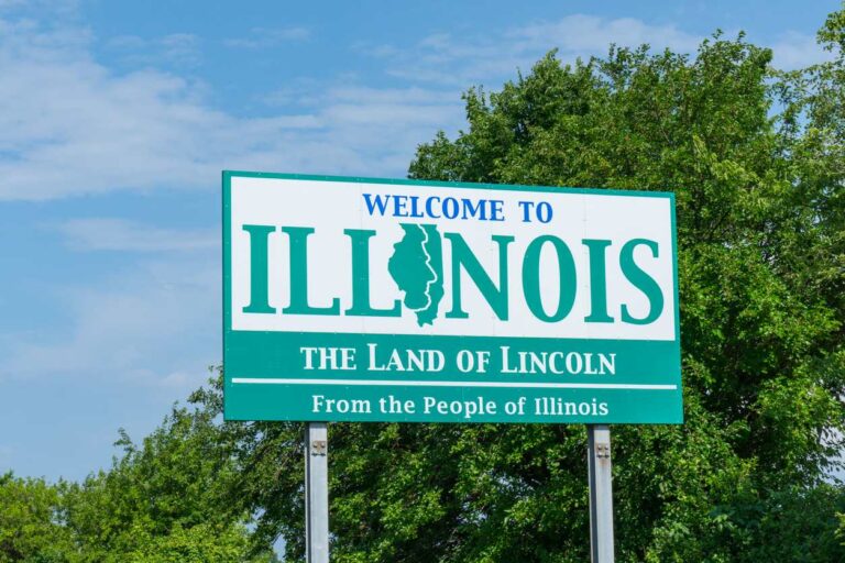A highway sign that says “Welcome to Illinois”.